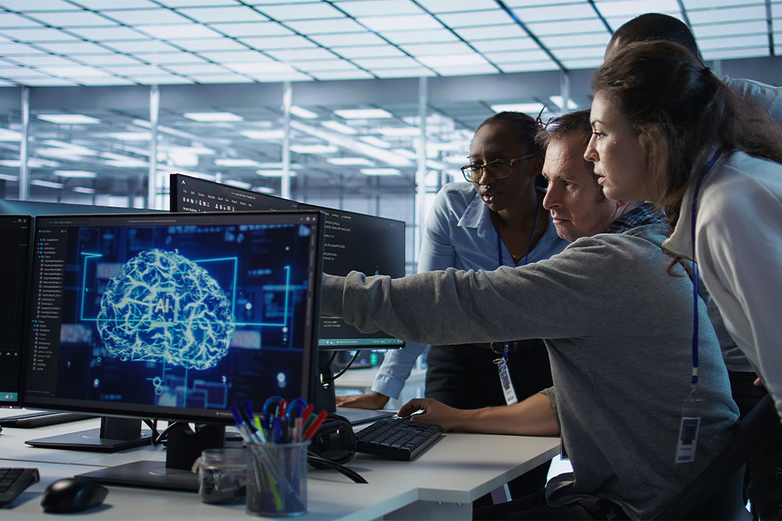 Engineer calling colleagues after finding error in code while doing checkup on server room used for AI workloads