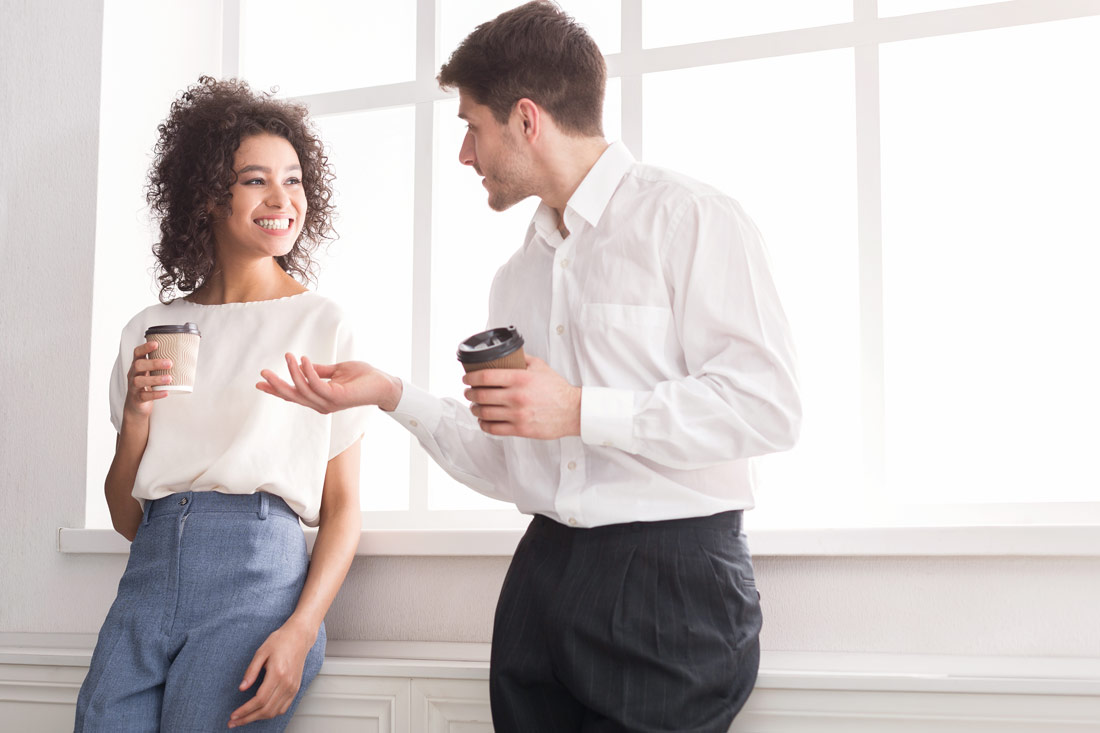 colleagues getting coffee together to boost personal development goals