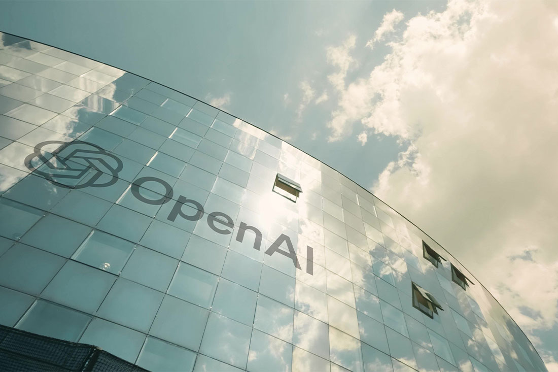 OpenAI logo on the modern office building, view from below